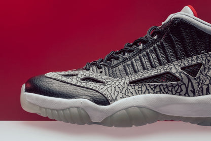 Air Jordan 11 Retro Low IE "Black Cement" - Black/Fire Red